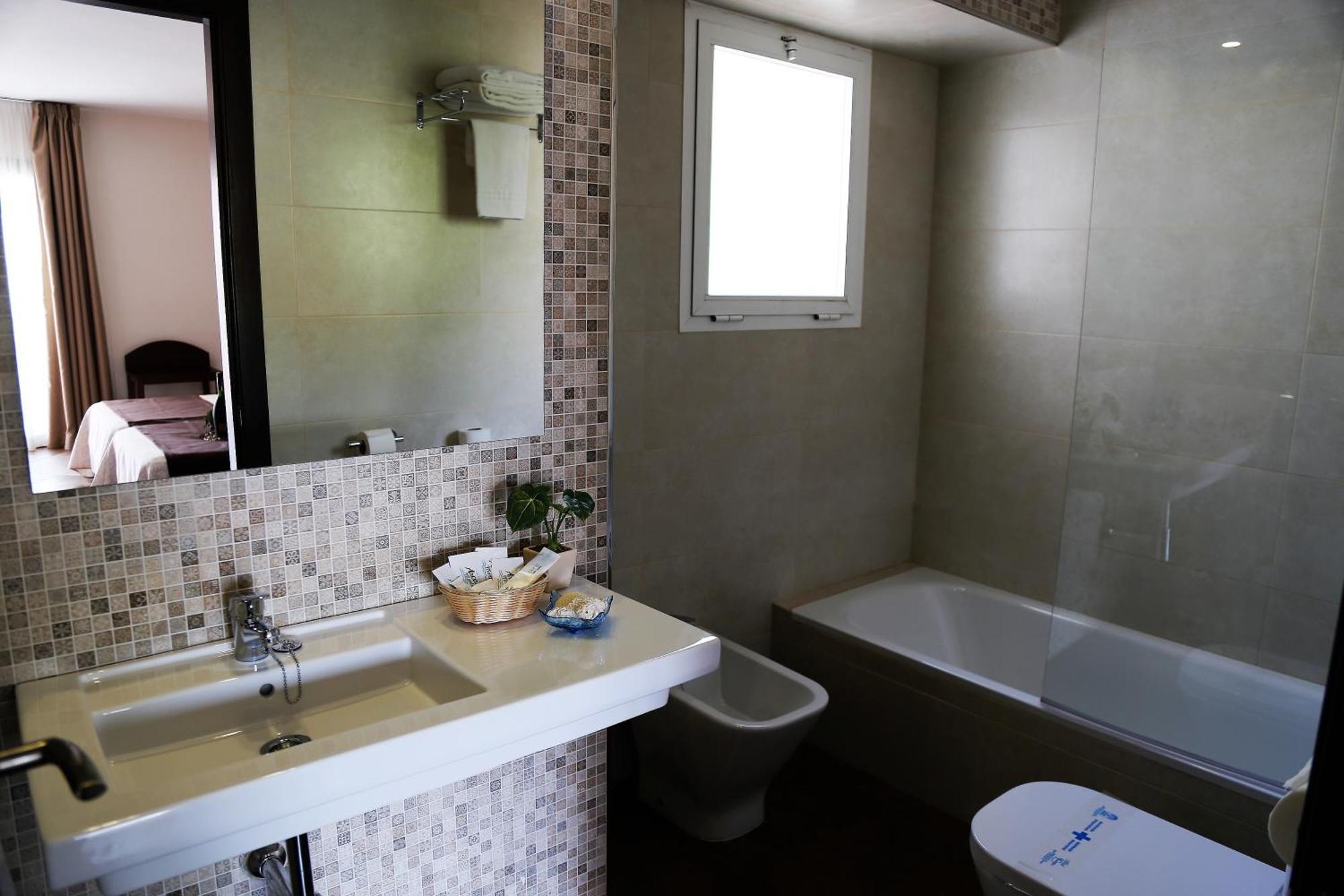 Habitación Doble con cama supletoria y terraza